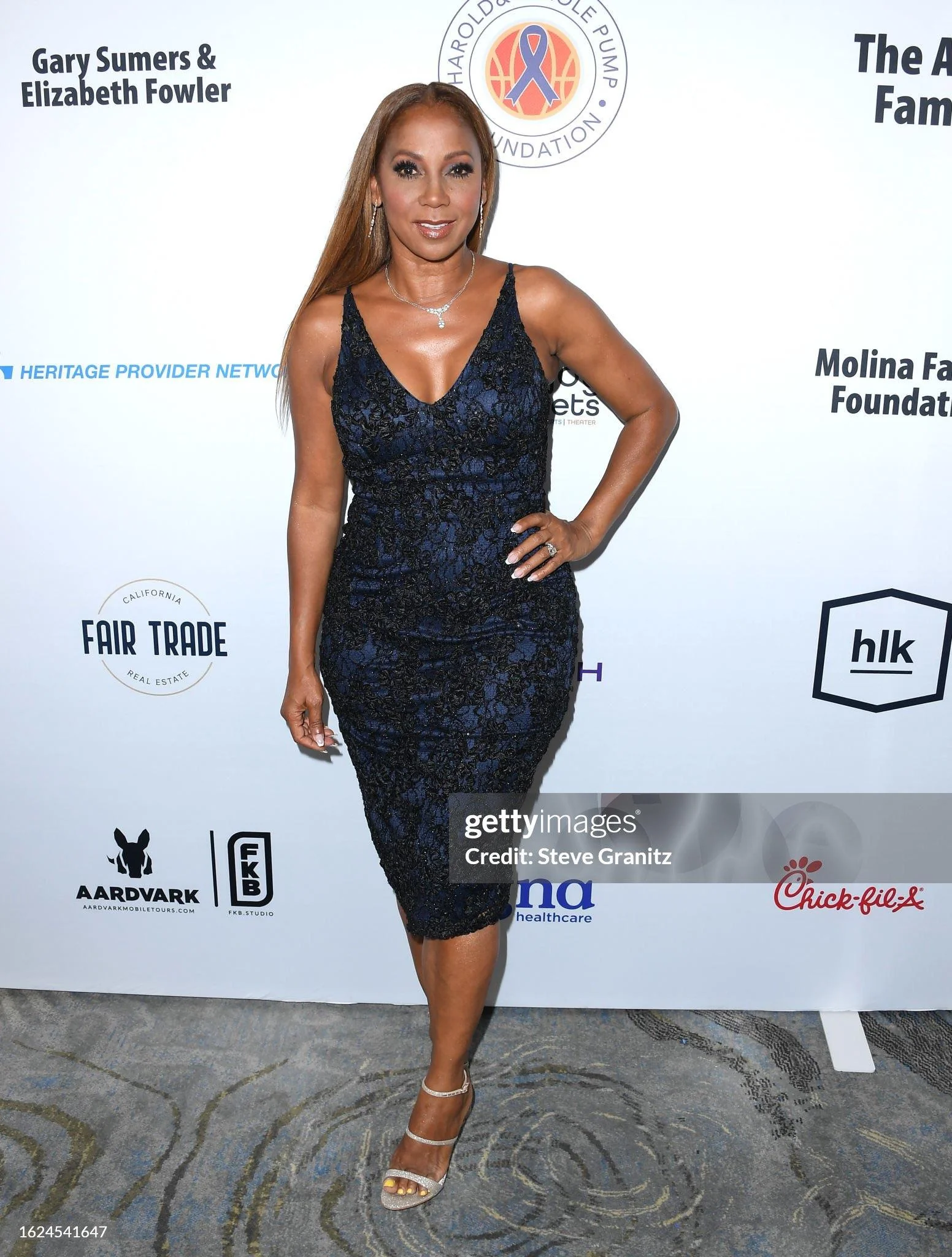 Holly Robinson Peete, 60 picture 1 of 2
