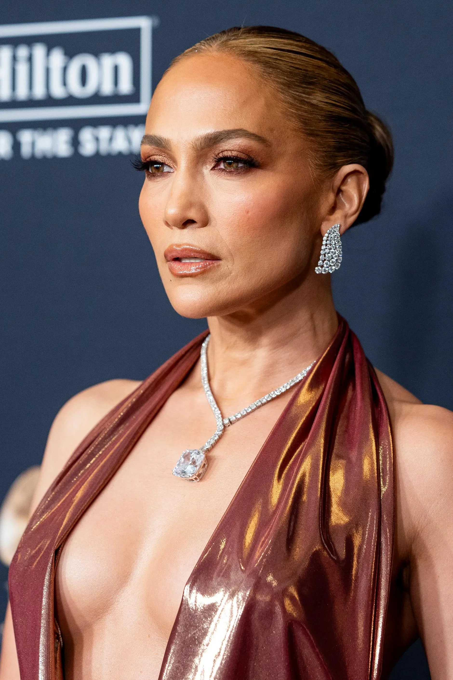 Jennifer Lopez, 55 showing off her beautiful Chest at the 2025 pre-Grammys Gala picture 3 of 5