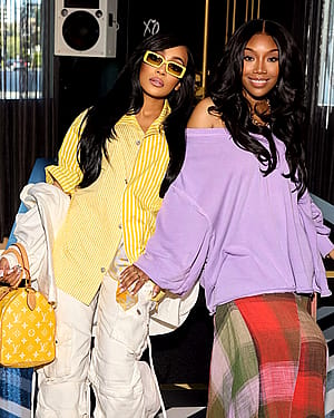 Monica Denise Arnold, 44 x Brandy Norwood, 46'