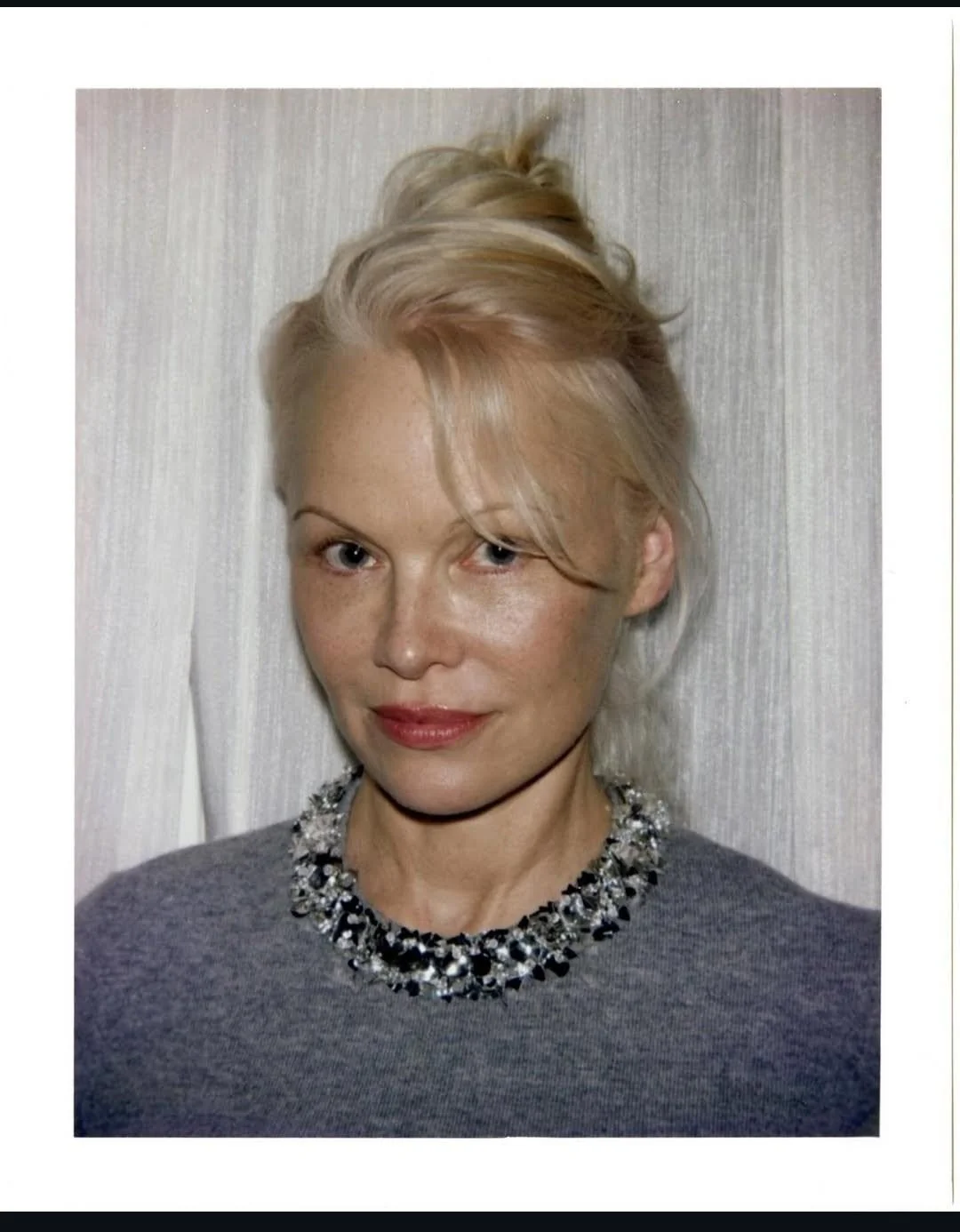 Pamela Anderson, 58 picture 1 of 3